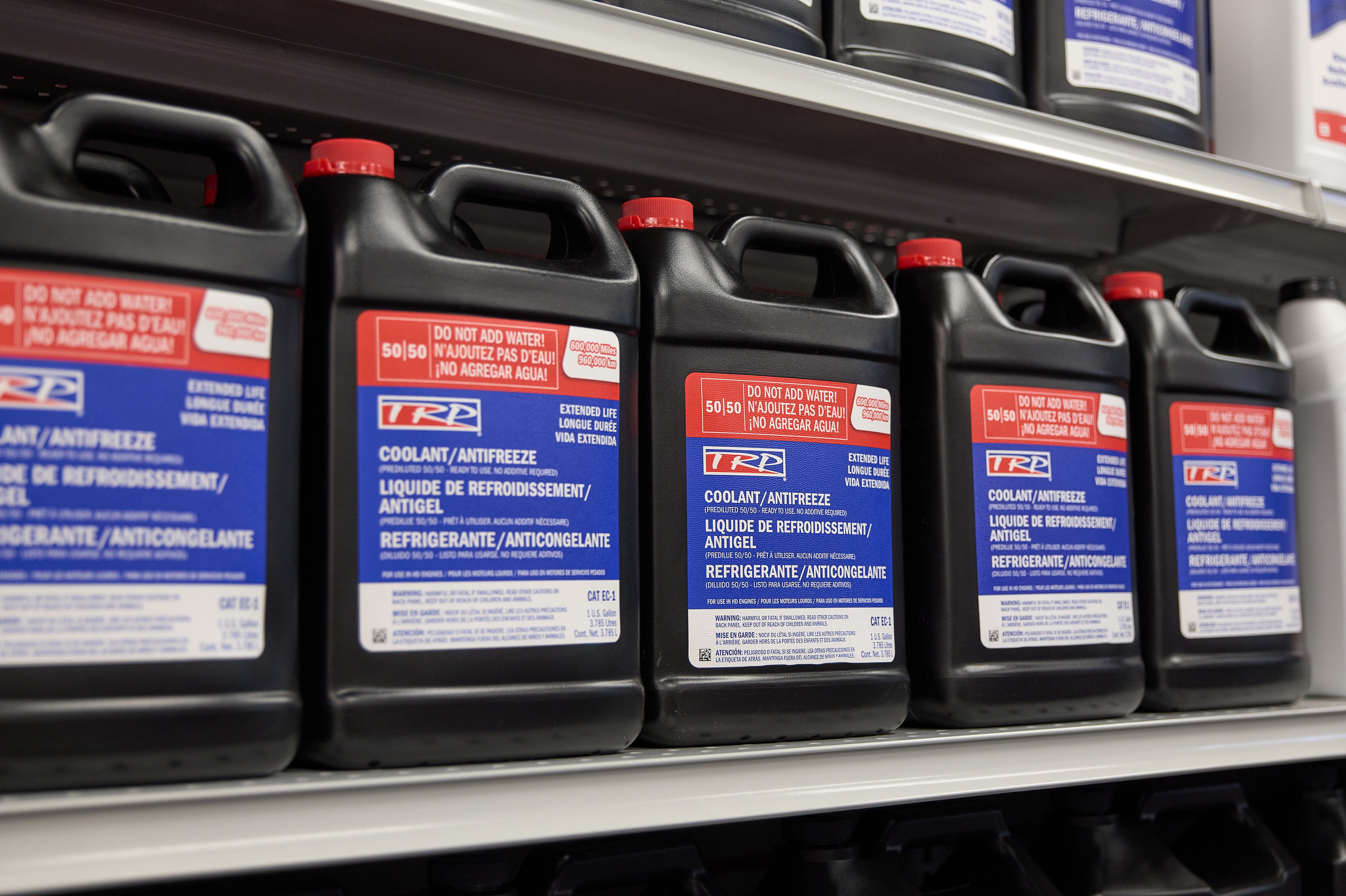 PB Service Tech Pouring Coolant Image
